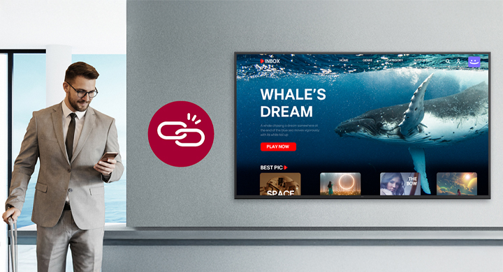 A man is checking out while OTT content is playing on the hotel room TV. The image illustrates a scenario related to the local PMS feature that supports automatic logout upon checkout.