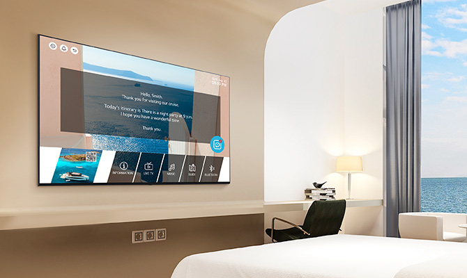 An LG commercial TV is installed in a resort room.